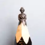 Reine Elisabeth II - Cette mine représente la Reine Elisabeth II.