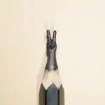 Main en signe de victoire - Main humaine levée formant un signe V (victoire).